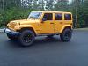 New to the Jeep World..2012 Dozer Orange - black wheels?-406872_10152235002945092_895778390_n.jpg