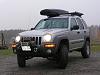 A photo of our 2004 lifted and slightly modded KJ-winch-001.jpg